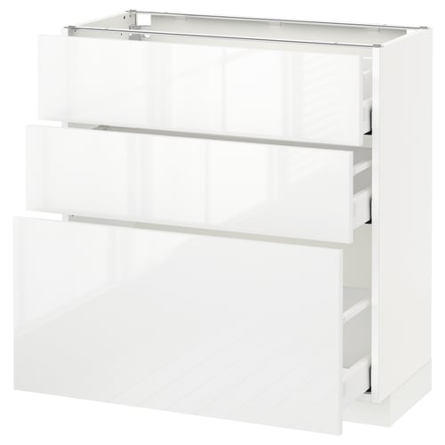 This image shows an ikea METOD kitchen cabinet in white with three drawers and a glass top shelf.