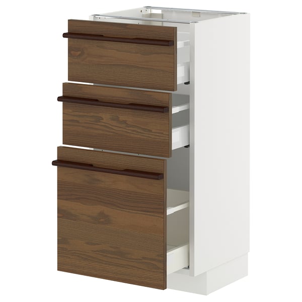 METOD kitchen unit with 3 brown wooden drawers, white sides, horizontal handles.