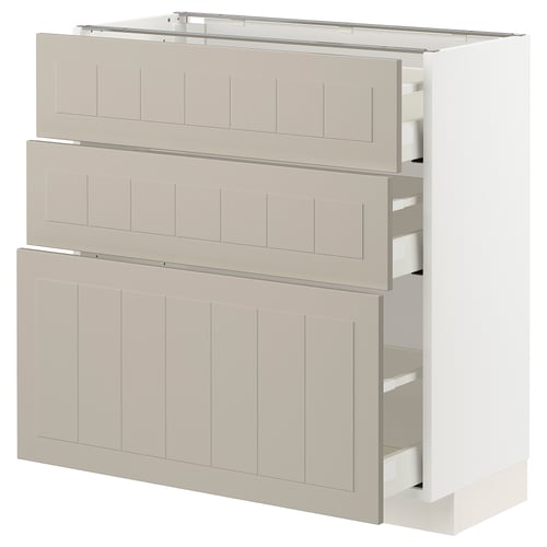 A beige METOD kitchen cabinet with multiple drawers, aesthetically crafted with a smooth, modern design.