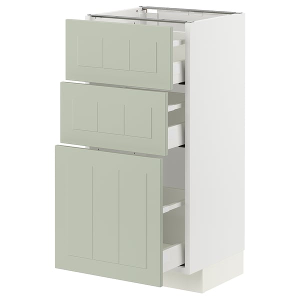 A METOD kitchen cabinet with green stensund fronts, featuring multiple drawers and a sleek, modern design.