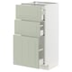 A METOD kitchen cabinet with green stensund fronts, featuring multiple drawers and a sleek, modern design.