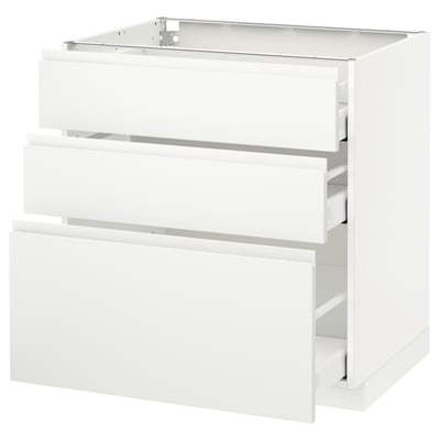 A modern white METOD kitchen cabinet with three drawers. The cabinet has a sleek, minimalist design with integrated handles.
