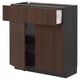 Dark brown wooden kitchen cabinet with drawer and shelves.