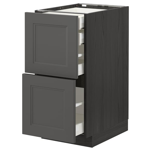 An open dark gray METOD kitchen cabinet with drawers, featuring a wooden design.