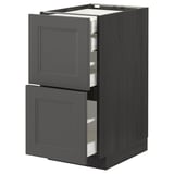 An open dark gray METOD kitchen cabinet with drawers, featuring a wooden design.