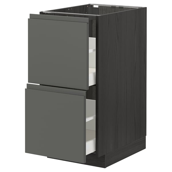 Dark grey kitchen cabinet with 2 open drawers, sleek design, modern & sturdy.