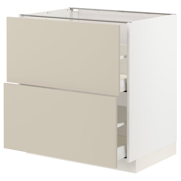 A beige METOD kitchen cabinet with two drawers. It has a modern, minimalist design.