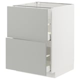 A modern white METOD kitchen cabinet with light grey havstorp drawers and doors, featuring a sleek design and clean lines.