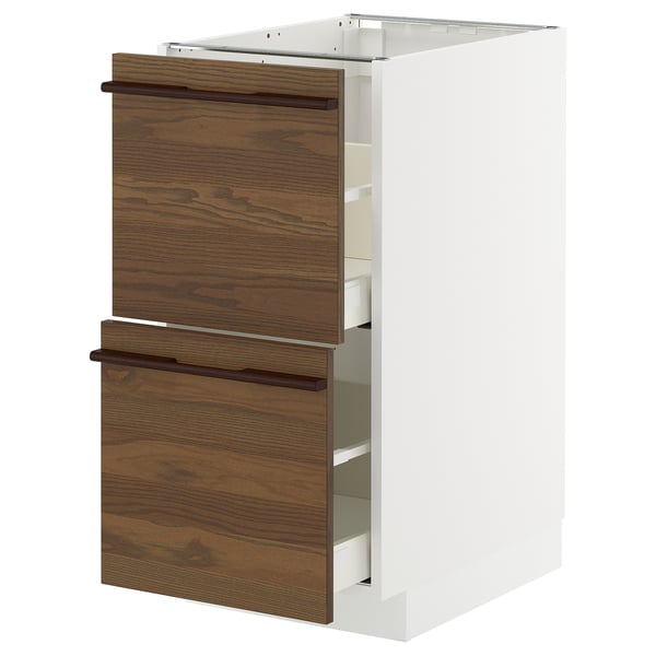 White METOD cabinet with dark brown drawers.
