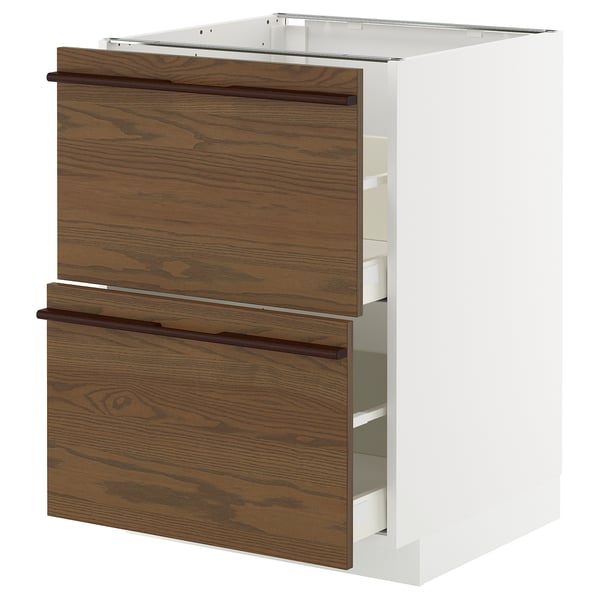 White METOD kitchen cabinet with dark brown drawers and wooden handles.