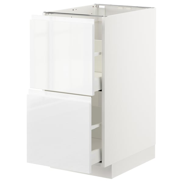 White METOD kitchen unit with glossy drawer fronts and smooth runners.