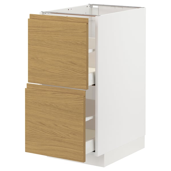 Modern white and wood kitchen cabinet with drawers.