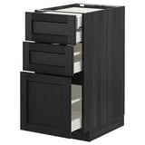 Black wooden kitchen cabinet with three open drawers, showcasing modern design and smooth finishes.