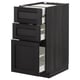 Black wooden kitchen cabinet with three open drawers, showcasing modern design and smooth finishes.