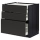 Black modern kitchen unit with three drawers, sleek handles, sturdy wood, self-closing drawers.