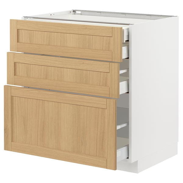 Ikea METOD unit with forsbacka oak veneer drawers and white cabinet base. Modern, classic design with beveled drawer edges.