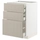 White METOD kitchen cabinet with beige stensund drawers and doors.