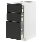 Modern kitchen cabinet, white and black, three drawers, sleek design.