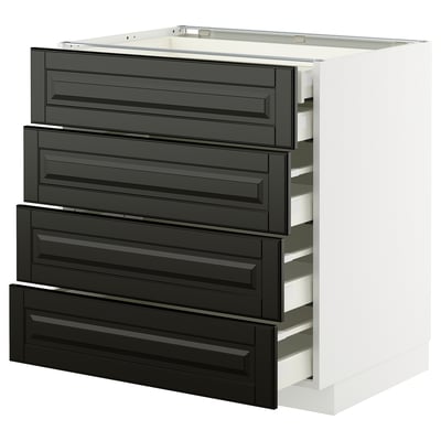 A white METOD kitchen cabinet with four black beveled edge drawers. It has a modern, sleek design.