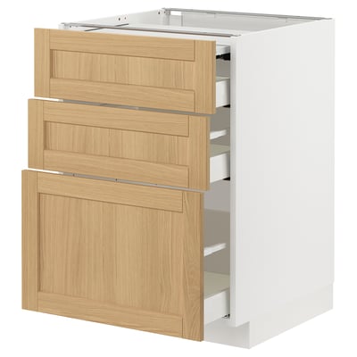 Modern kitchen cabinet, light wood drawers, white frame, sleek design.