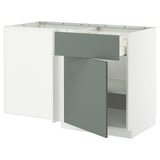 METOD kitchen unit with grey-green matte doors, white base, open right side.