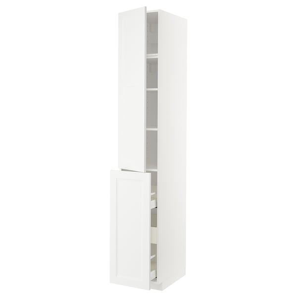 A white METOD kitchen cabinet with a modern design, featuring multiple shelves and a pull-out drawer.