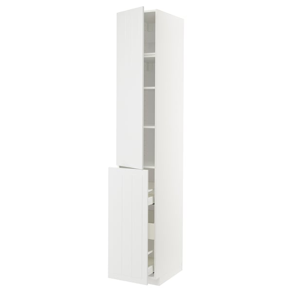 A white METOD kitchen cabinet with two open doors revealing shelves inside.
