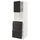A white METOD kitchen cabinet with black doors and drawers, featuring a modern design with soft-closing drawers.