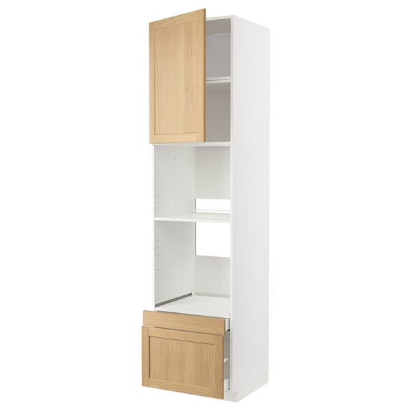METOD kitchen unit with oak-veneer doors. White frame, tall, two shelves, wooden drawer.