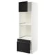 White METOD kitchen unit with black stained wood drawers and shelf.
