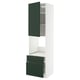 Modern kitchen unit with green doors and white frame, tall and narrow.