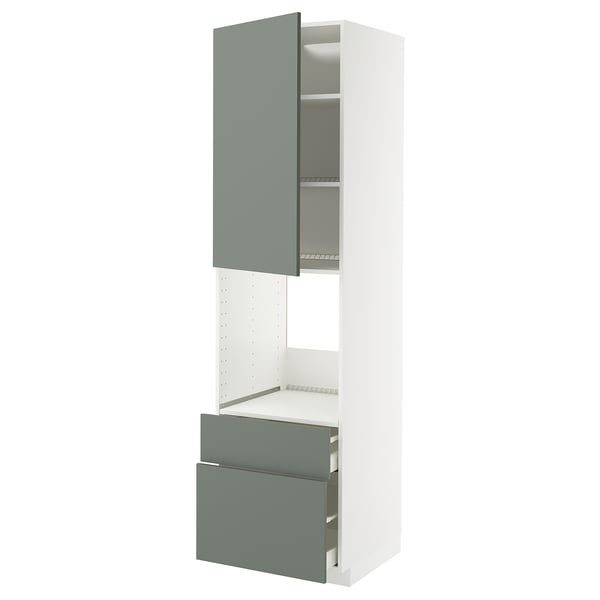 A modern, white kitchen cabinet with grey-green doors and a drawer. It a sleek, tall design with adjustable shelves and smooth-running drawers.