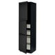 Black cabinet with bevelled edges, two open doors revealing shelves.