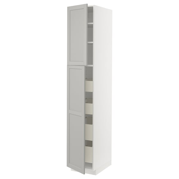 A white METOD kitchen cabinet with open doors and visible shelves.