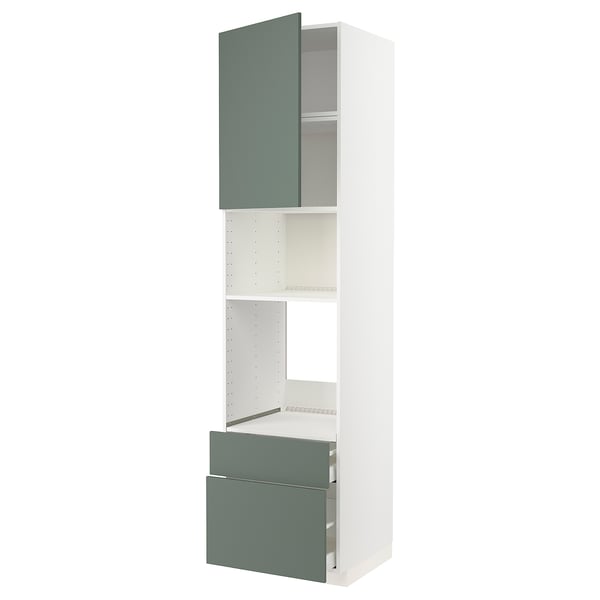 A white METOD kitchen unit with green-gray bodarp doors, including cabinets and drawers.