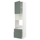 A white METOD kitchen unit with green-gray bodarp doors, including cabinets and drawers.