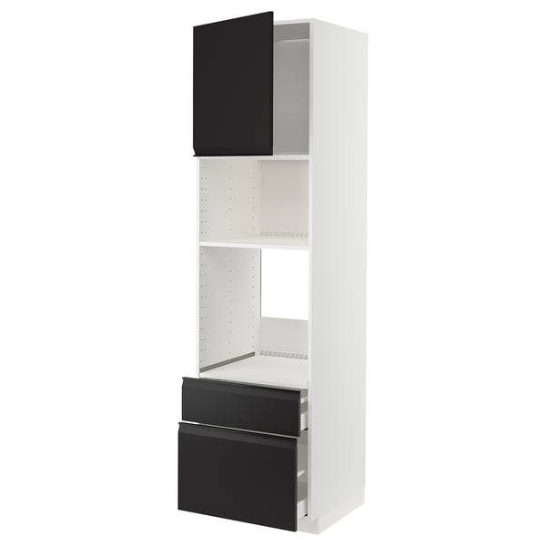 Modern white and black kitchen unit, consisting of high cabinet with open shelf, two drawers, and door in matte black with metallic handles.