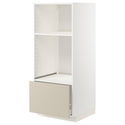 This image shows a white METOD kitchen cabinet with a beige drawer. The cabinet adjustable shelves and a sturdy, modern design with clean lines.