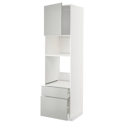 A white METOD kitchen unit with multiple compartments, including drawers and shelves. The unit a modern clean design with light grey handles.