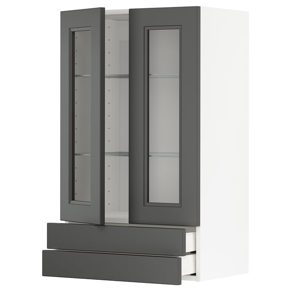 Modern kitchen unit with grey glass doors and drawers, featuring a sleek design for storage.