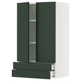 Modern green ikea METOD kitchen cabinet with adjustable shelf and drawers.