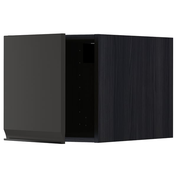 A modern black kitchen cabinet with a sleek, handle-less design.