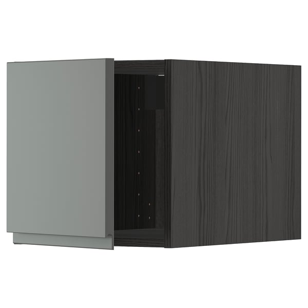 A modern, grey kitchen cabinet from the METOD system, featuring dark grey voxtorp fronts with sleek, integrated handles.
