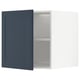 Image shows open blue METOD kitchen cabinet with two shelves.