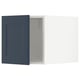 Ikea METOD kitchen cabinet in blue with recessed panel design.