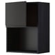 Modern black kitchen unit with adjustable shelf, slim design.