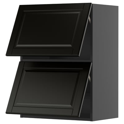 Black kitchen cabinet set with beveled edges and 2 open drawers.