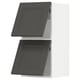 Two dark grey IKEA METOD kitchen cabinets. Left one closed, right one open.