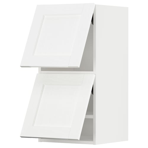 Ikea METOD kitchen cabinet in white. Two square doors with grooved edges. Sleek, modern design with sturdy frame.