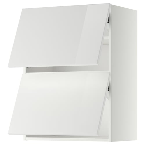 A white METOD kitchen cabinet with glossy finish and modern design.